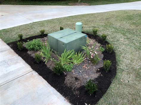 how to plant around electrical boxes|landscaping around utility boxes.